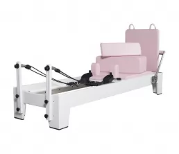 Equipo de pilates rosa de roble blanco pintado