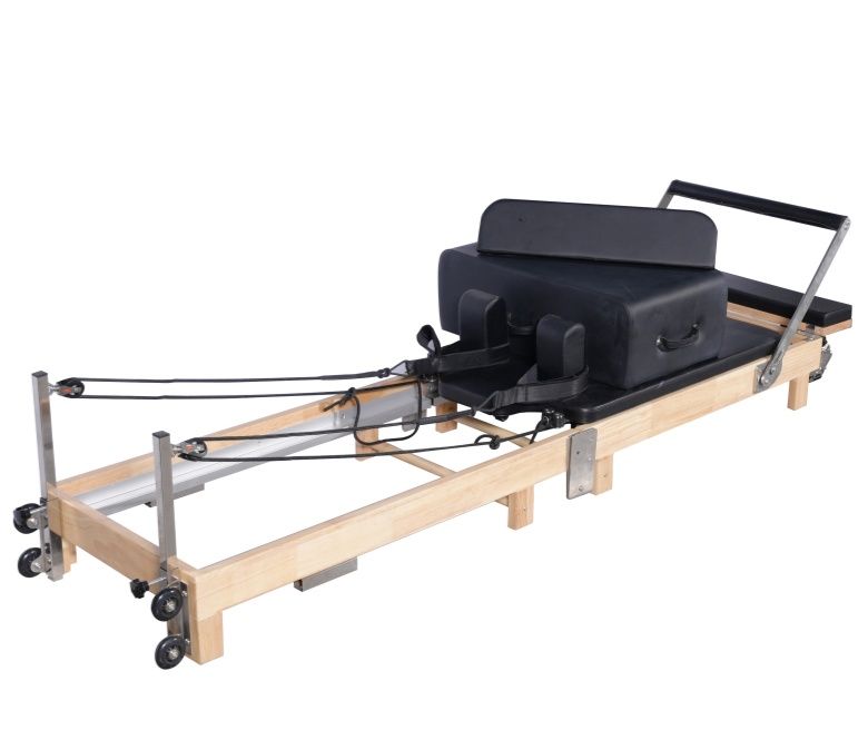 En el hogar reformador de pilates plegable de madera
