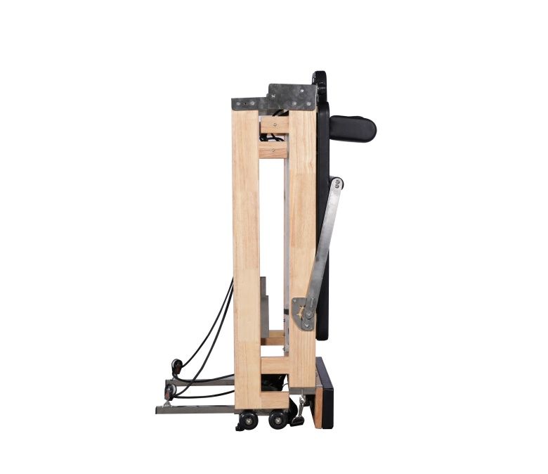 En el hogar reformador de pilates plegable de madera