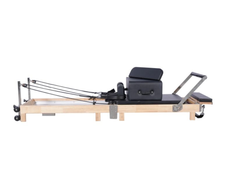 En el hogar reformador de pilates plegable de madera