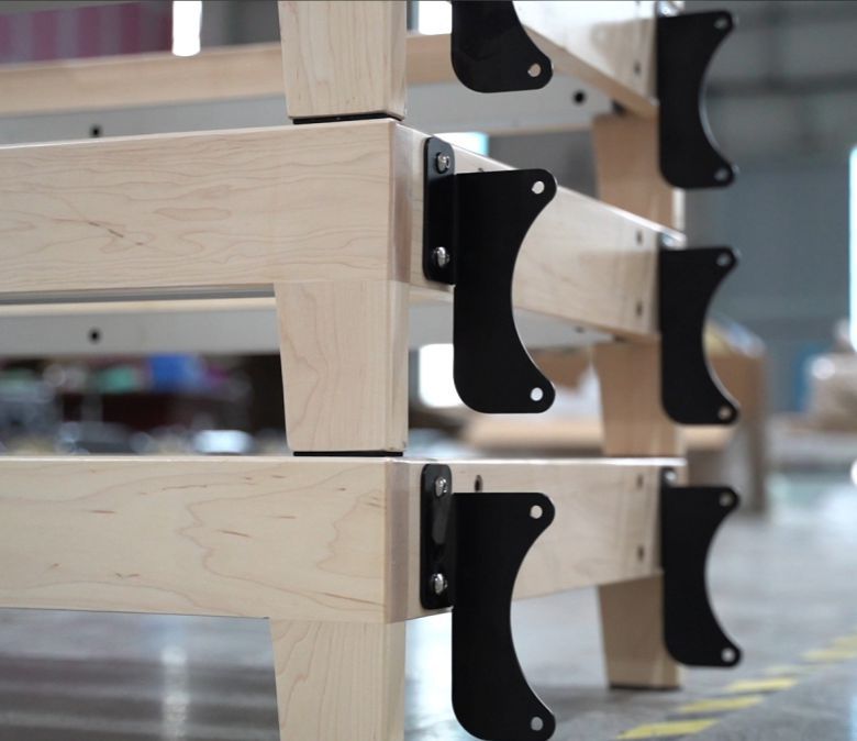 Máquina de ejercicio pilates plegable con patas de madera