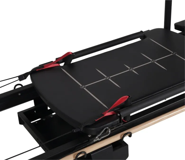 Máquina reformador de Pilates con manijas giratorias